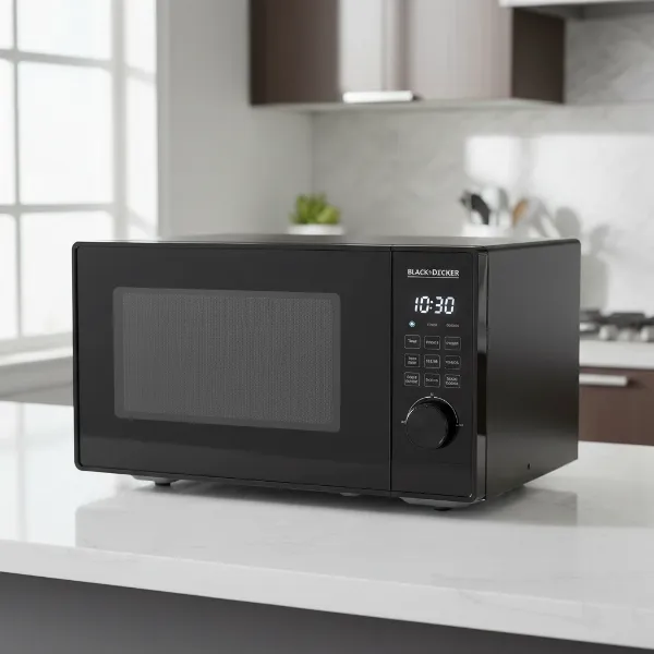 Black+Decker digital microwave in a modern kitchen, showcasing its sleek design and user-friendly controls.
